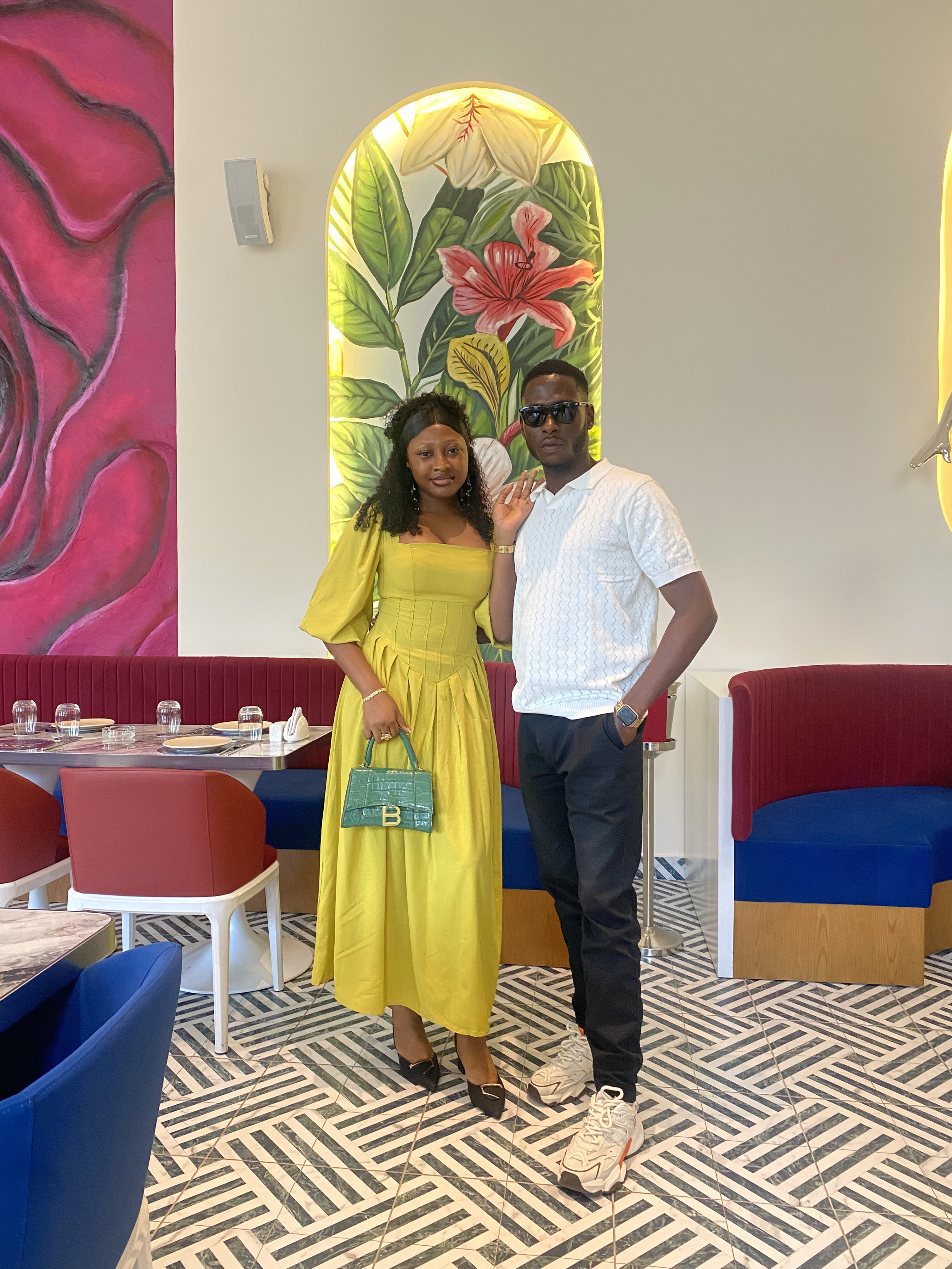 Precious and Emmanuel standing together after a shared outing